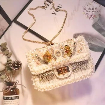 

In 2020, Chinese brand high quality fashionable diamond inlaid new style women's straddle handbag, free delivery