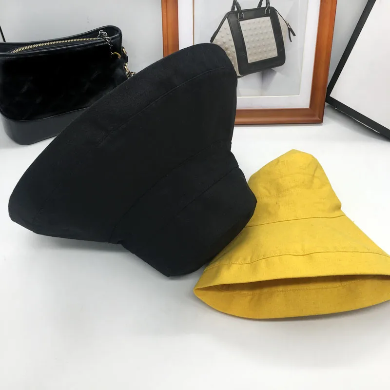 

cloche hat New spring and summer female eaves fisherman cap folding M letters tidal basin hat leisure Bucket Hats
