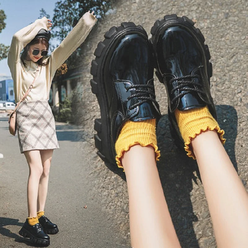 

2019 new Korean version of the British wind with high-heeled small shoes wild thick bottom increased women's shoes.