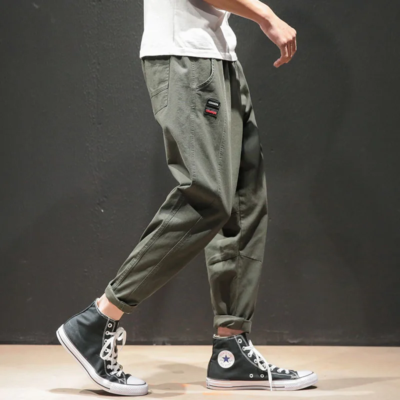 Черный бренд моды оверсайз Streetwear уличная Мужская брюки Харадзюку с свободным досугом стежка эластичность Сращивание прямой крой брюки