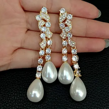 

Teardrop White Sea Sell Pearl Cz pave Yellow Golden Plated Earrings
