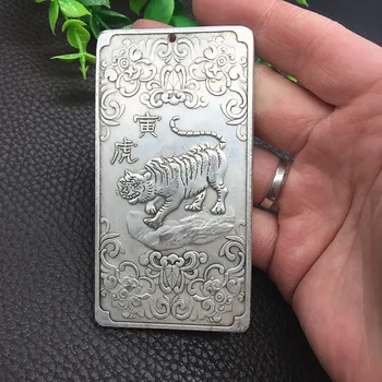 

Pure white copper, twelve zodiac tiger number plate on a vehicle