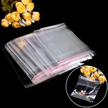 

100pcs Transparent Plastic Self Adhesive Bag Sealing Small Bags For Jewelry Candy Packing Resealable Gift Cookie Packaging Bag