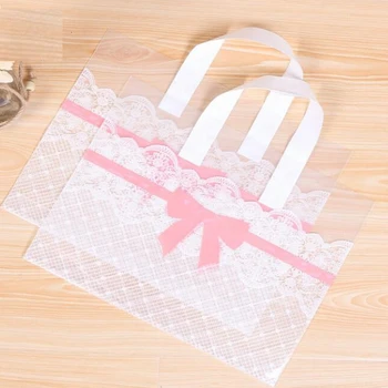 

50pcs 33x25cm large Shopping Plastic Bag With Handles big Gift Bags Jewelry Cookies bag Big pink bowknot Supermarket Clothes Bag