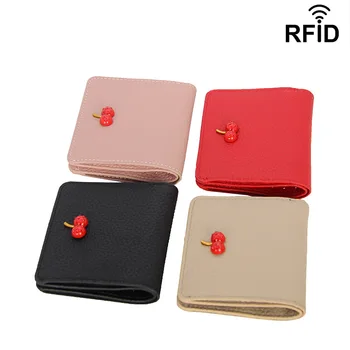 

The first layer of leather 2020 new ladies simple small cherry short wallet leather buckle ultra-thin multi-card wallet