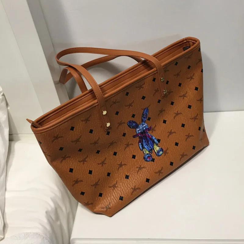

Commuter bag 2020 new tote bag large capacity soft leather simple hand bill of lading shoulder bag women bag shopping bag trend