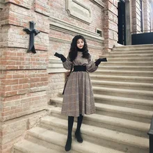 Осень и зима стиль шерстяное клетчатое платье с высоким воротником женское свободное приталенное облегающее платье средней длины с пышными рукавами