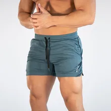 Новые летние мужские шорты для фитнеса бодибилдинга мужские сетчатые дышащие быстросохнущие Модные Повседневные Шорты Для Бега спортивная одежда