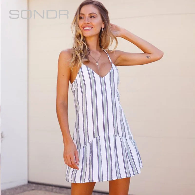 white dungaree dress