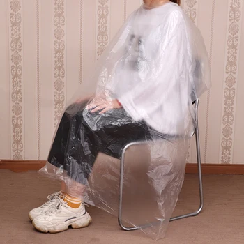 

50 Pcs Disposable Waterproof Hairdressing Capes PE Hair Cutting Gown