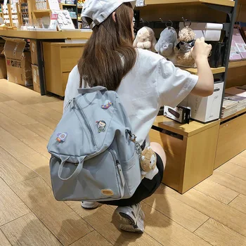 

Hot female College student bag Large Capacity Solid Color Detachable Frog School Bag Couple Backpack men and women Shoulder Bags