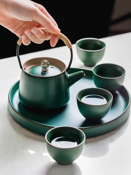 

Retro portable small teapot coarse pottery Pu 'er tea pot creative cups tea set