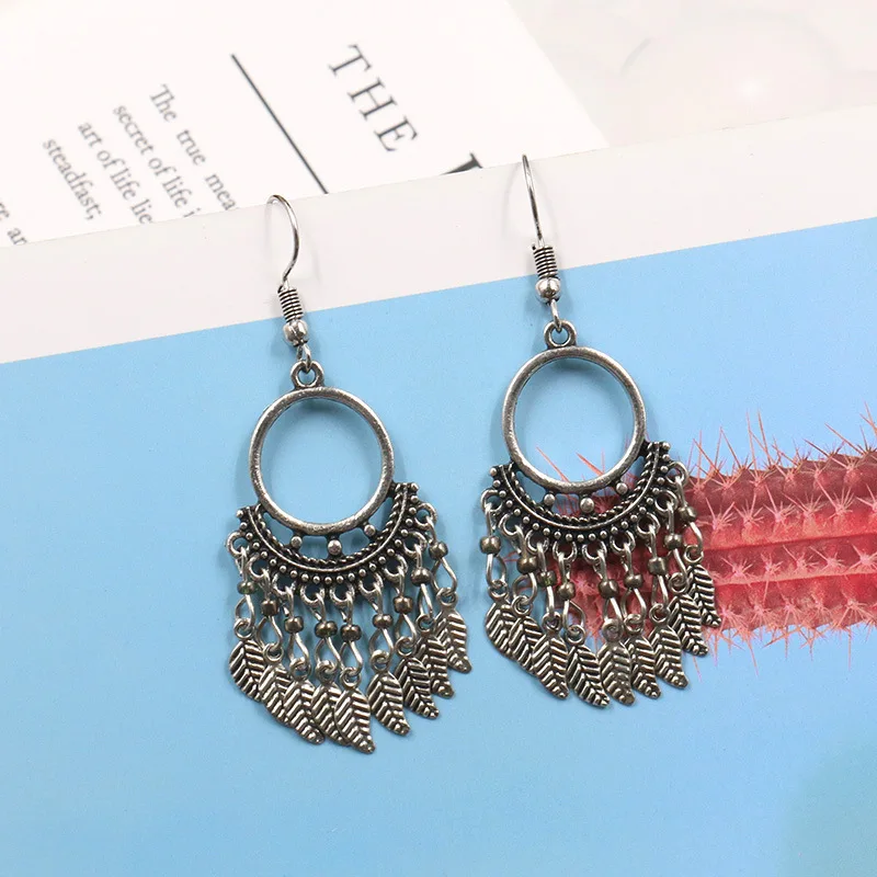 

Minority style creative popular accessories geometric round alloy pendant leaf leaf tassel earrings ear pendant