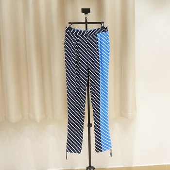 

New Light and decoration down comfortable is not easy to crease Personality pants since the waist foot trousers