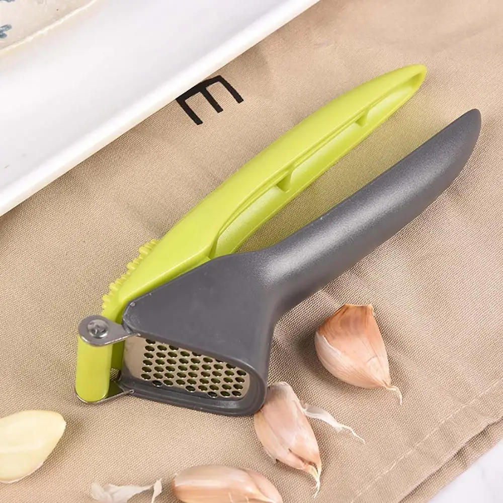 

Stainless steel garlic paste artifact plastic handle plastic pounder 1pc