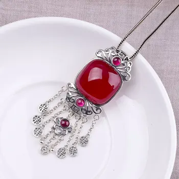 

Character silver items S925 pure silver ornaments Thai silver handmade ms red corundum tassel pendant qiu dong joker