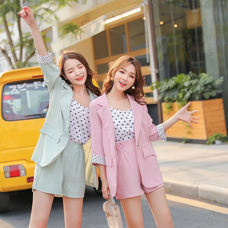 

2020 spring and summer net red with the same suit suit female stitching wave dot thin two-piece suit