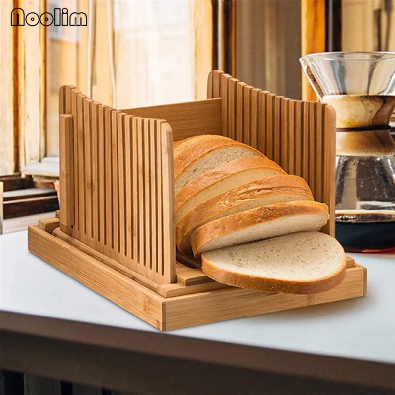 https://ae01.alicdn.com/kf/Hde44e29c9556425086994d90414aa009z/Nordic-Foldable-Bamboo-Plastic-Bread-Slicer-Wood-Cutter-Toast-Loaf-Cutting-Guide-Slicing-Maker-Kitchen-DIY.jpg