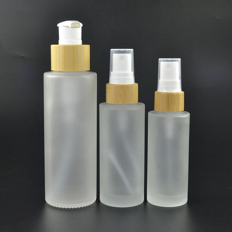 Wholesales Full Carton of Luxury Empty Cylinder Cosmeticos Frosted Serum Glass Bottle With Bamboo Cap