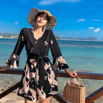 

Film shorts female summer new Thai jumpsuit v-neck cranes show thin horn sleeve wide-legged pants jumpsuits