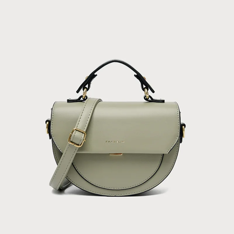 

New Euro-American Style Simple Letter Elliptical Saddle Bag Hand-held Bill of Lading Shoulder Crossing Women's Bag