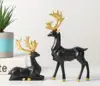 2Pcs Christmas Reindeer Figurines Nordic Style Small Resin Sitting Standing Deer Statues for Home Office Décor Synthetic Resin ► Photo 3/6