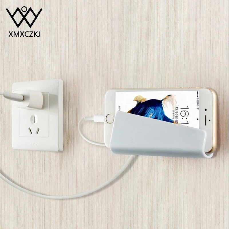 

Universal Wall Charger Phone Holder For iPhone 11 Tablet Wall Mount Holder Adhesive Stand For Samsung Phone Tablet Stand Holder
