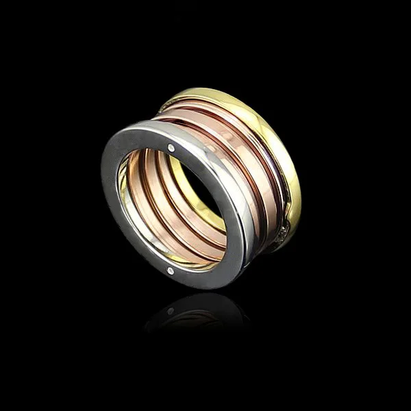 

Factory Price Wholesale Inter-color Spring Ring Couple Narrow Edition Inter-color Spring Ring Tri-color Rose Gold Spring Ring