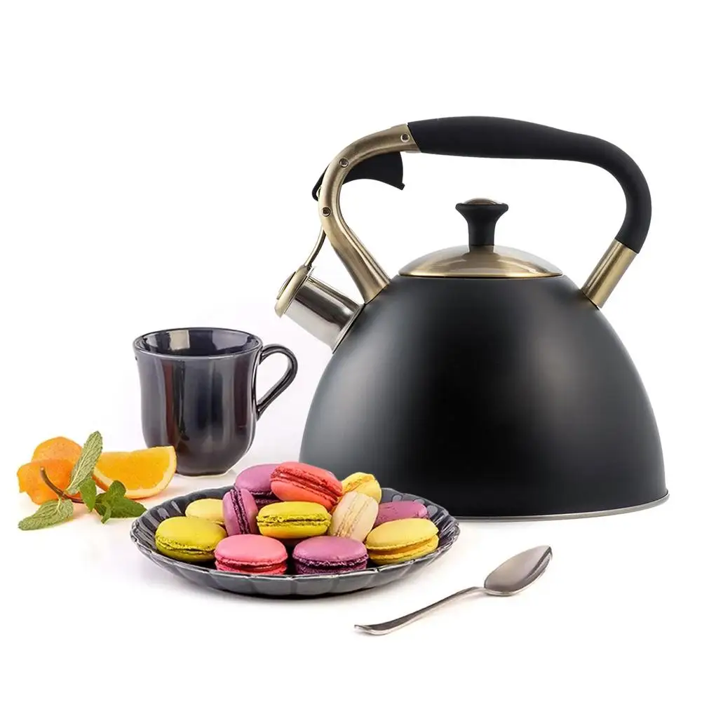 Stainless steel kettle pouring hot water