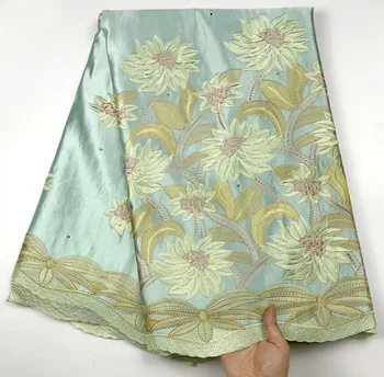 

Nigerian George Fabrics French Design aqua Green Lace Material Markdown Sale Indian Raw Silk Georges