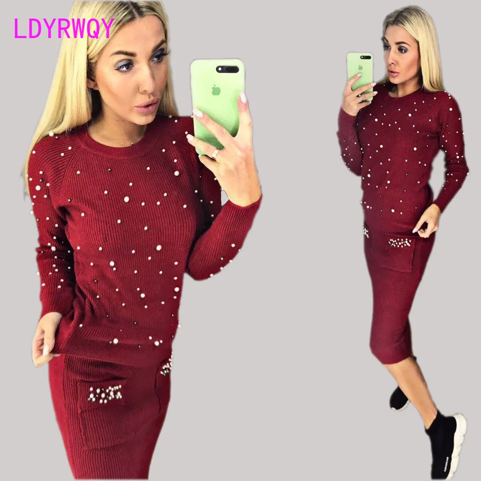 

2019 autumn and winter new knit sweater + skirt suit European and American women's fashion round neck two-piece