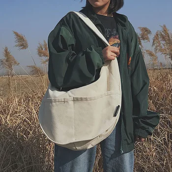 

Bag female new ins large capacity canvas bag literary college students class messenger bag dumplings package