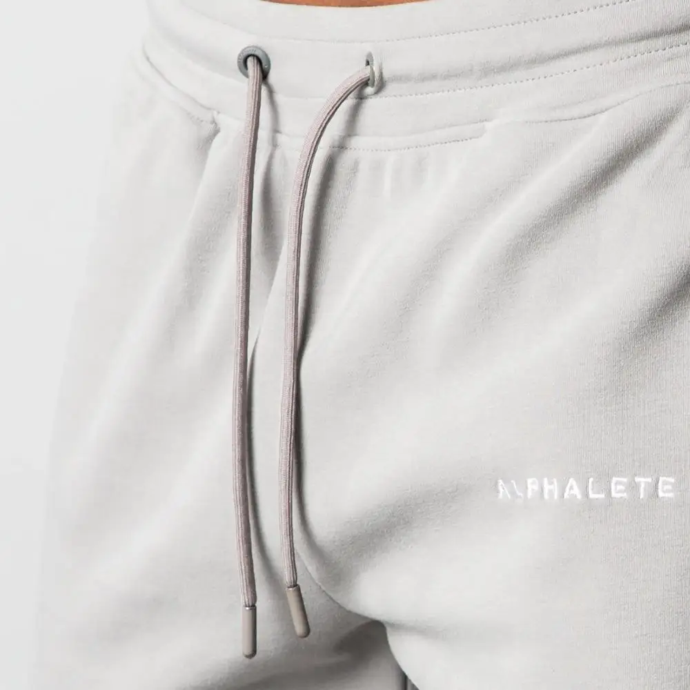 Бренд ALPHALETE, мужские спортивные штаны, Джоггеры для фитнеса, повседневные длинные штаны, мужские тренировочные обтягивающие спортивные штаны, тренировочный костюм для бега, хлопковые брюки