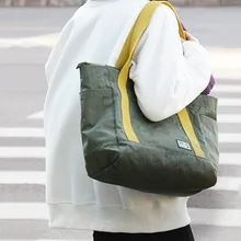 Женская сумка в европейском и американском стиле, прочная оксфордская ткань большого объема, Повседневная однотонная сумка для переноски, импортные товары, много карманов Sh