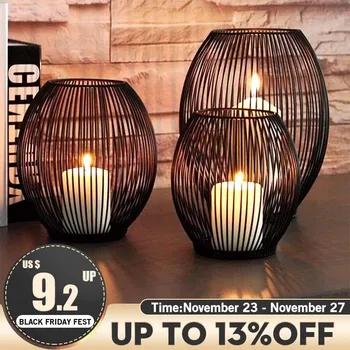 

Black Morden Metal Hollow Out Metal Iron Candle Holder Cage Articles Candlestick Hanging Lantern Home Decor Gifts