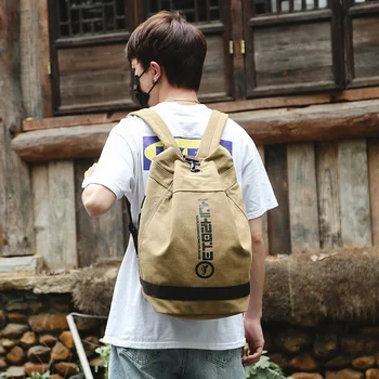 

2019 new Korean version canvas women's backpack bucket backpack leisure schoolbag men's basketball bag
