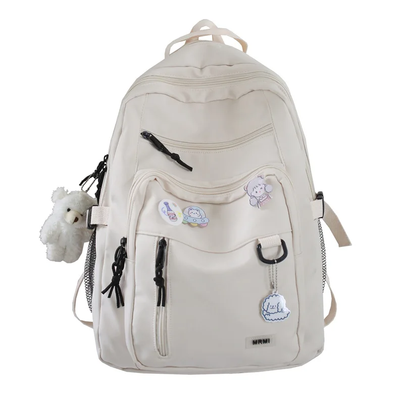 thumbnail image 1 of Mochila de moda para estudiantes, mochila con insignia, mochila escolar para niñas, mochila de alta capacidad para mujer, bonita para viajes de ocio, 1 of 5