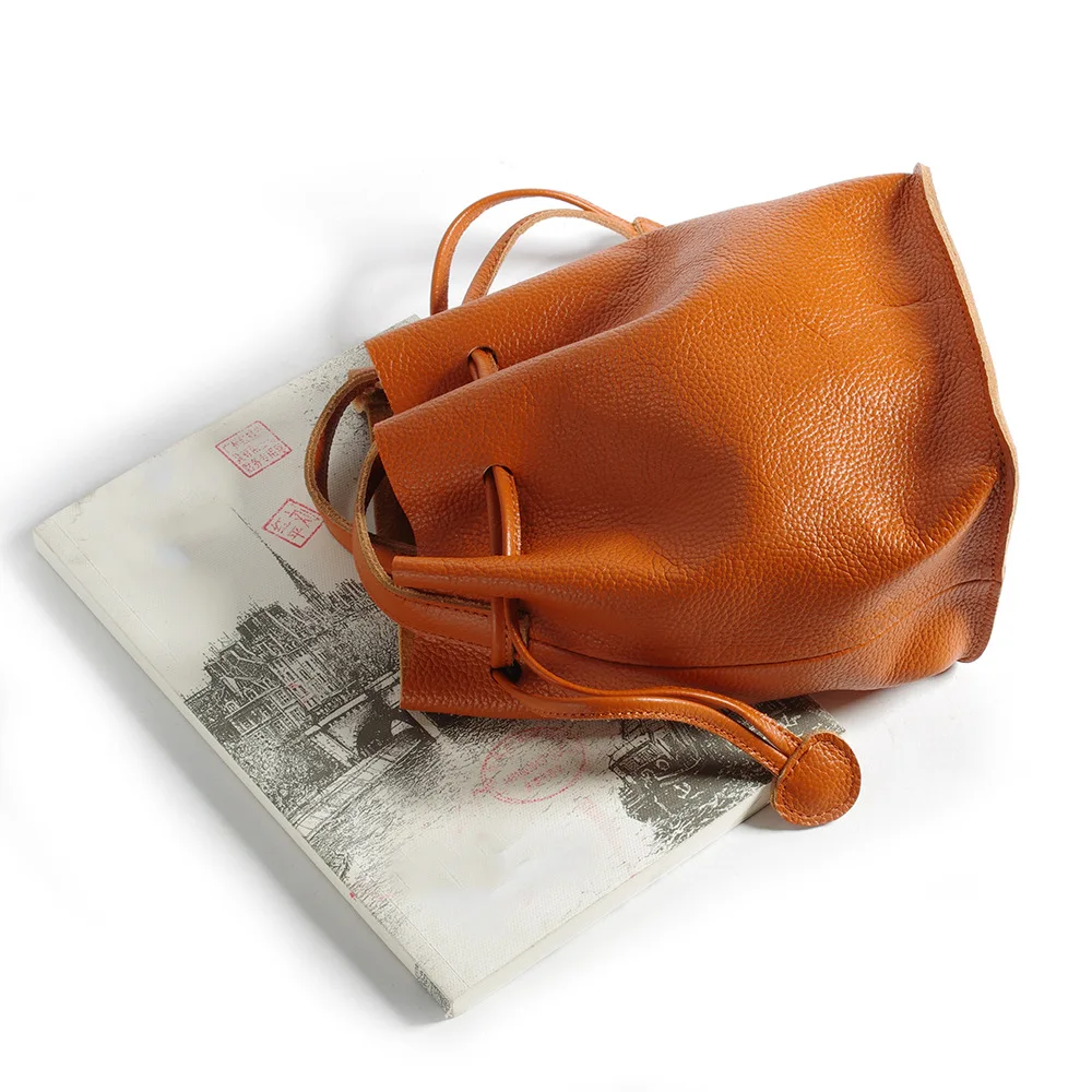 

Drawstring Bags Genuine First-Layer Cowhide Handbag One Shoulder Creative Mini String Cross- Shoulder Bags