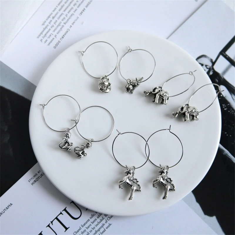 

Harajuku Vintage Silver Mermaid TailUnicorn Elephant Dinosaur Bird Dolphin Hoop earring Stereo Small Animal Earring