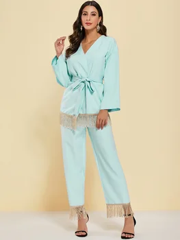 

Cross-border supply 2020 Europe and the United States new long-sleeved solid color loose shirt straight pants tassel set with be