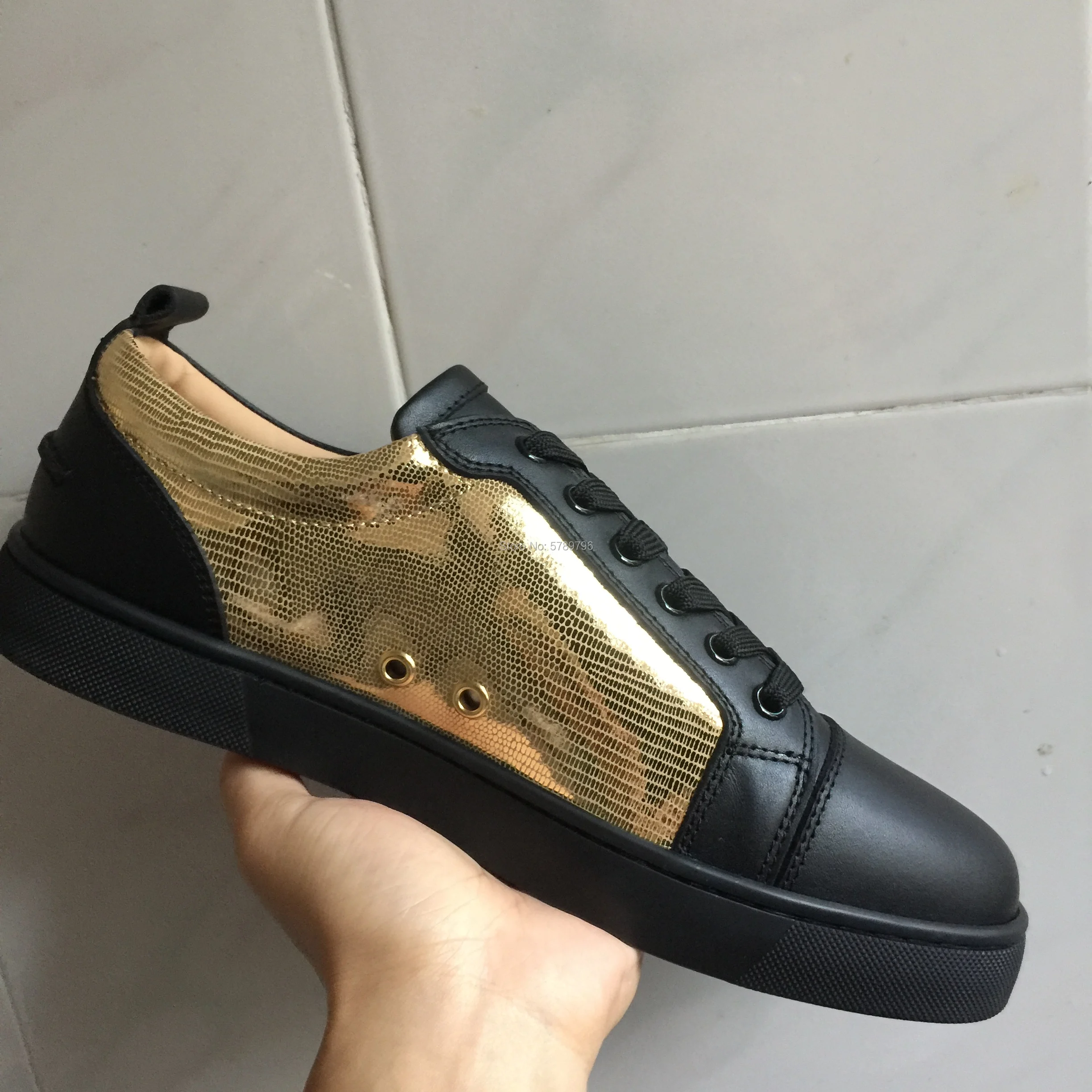 red black and gold sneakers