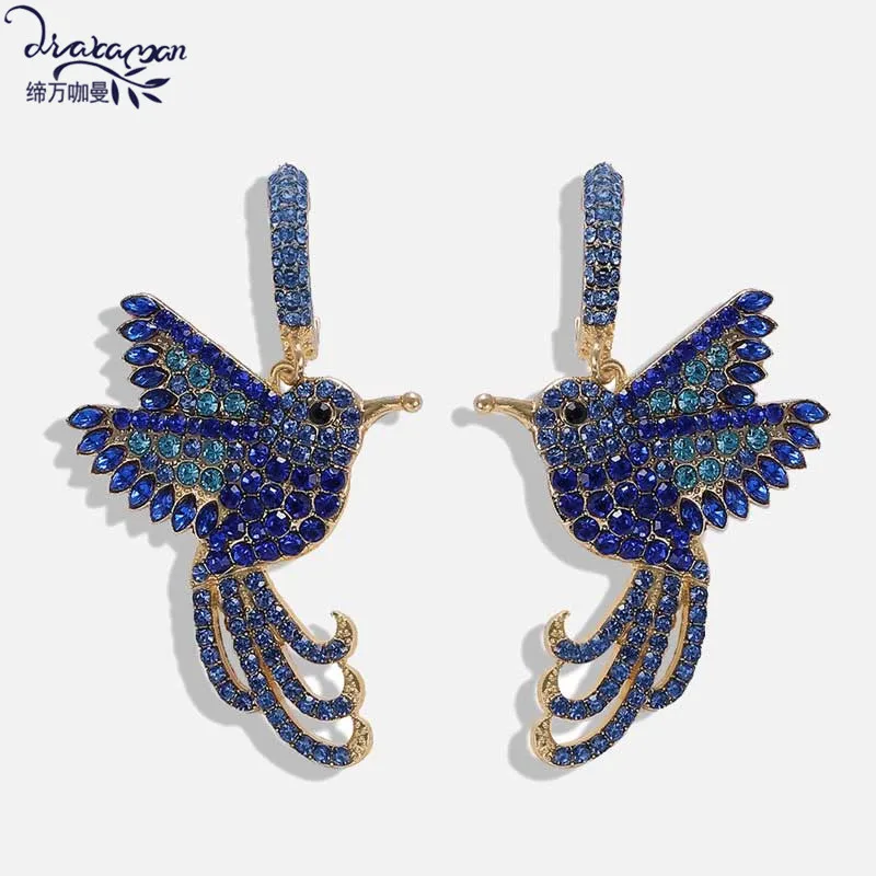 

Dvacaman Blue Crystal Bird Earrings in Drop Earrings Women Wedding Party Dangle Statement Earrings Handmade Design Gift Jewelry