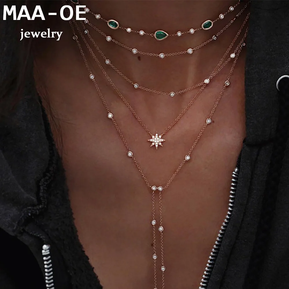 Ожерелье женское золотого цвета с подвеской в виде солнца и кристаллов |