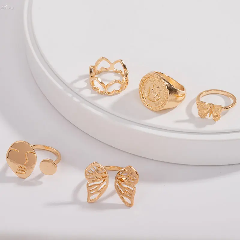 

AOMU Korea Simple Metal Geometric Round Human Face Rings For Women Hollow Butterfly Fashion Ring Jewelry Set