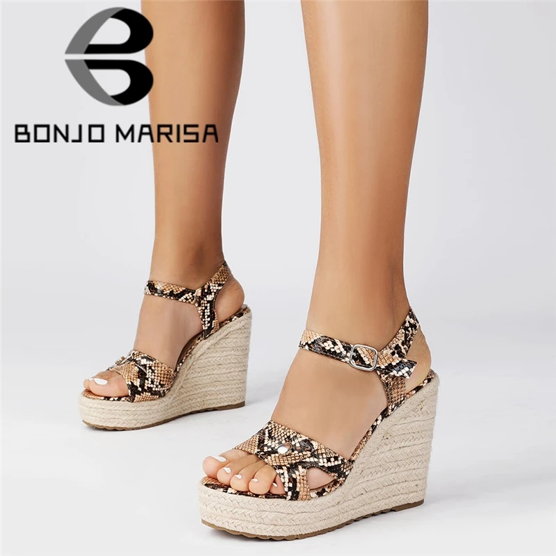 snakeskin platform wedges