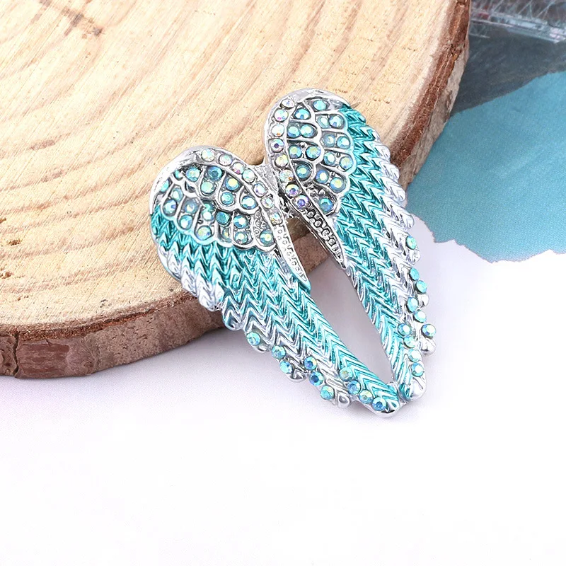 Crystal angel wings brooch