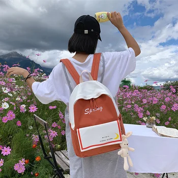 

Large capacity canvas backpack 2019 new fashion stitching student bag wear cute rabbit pendant youth girl backpack