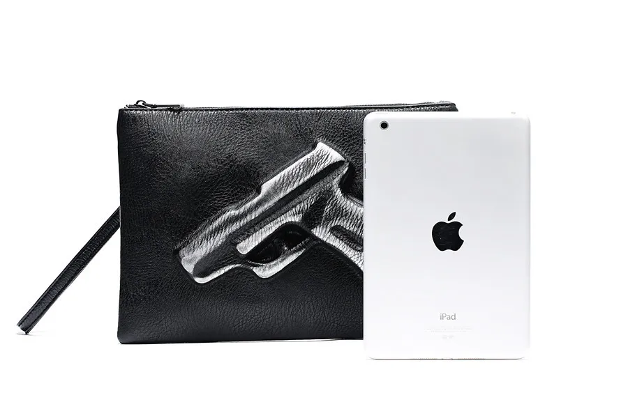Personality pattern three-dimensional street leather wrist bag Korean version of fashionable men's hand bag