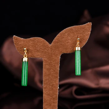 

Emerald cylindrical drop earrings fashion women's wear