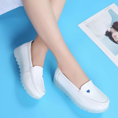 white flat nursing shoes